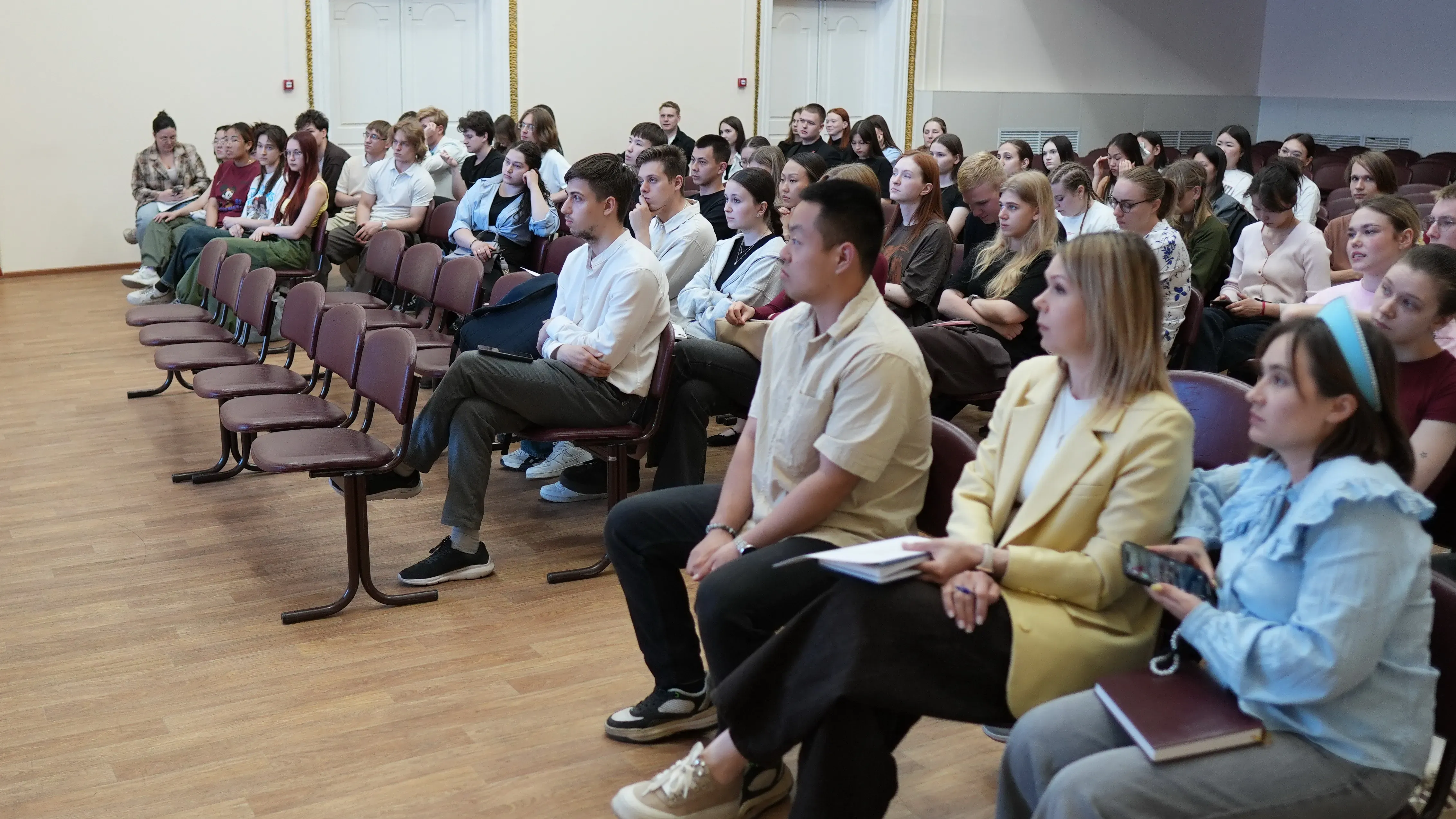 Students and representatives of student organizations attending a student government meeting at Amur State Medical Academy