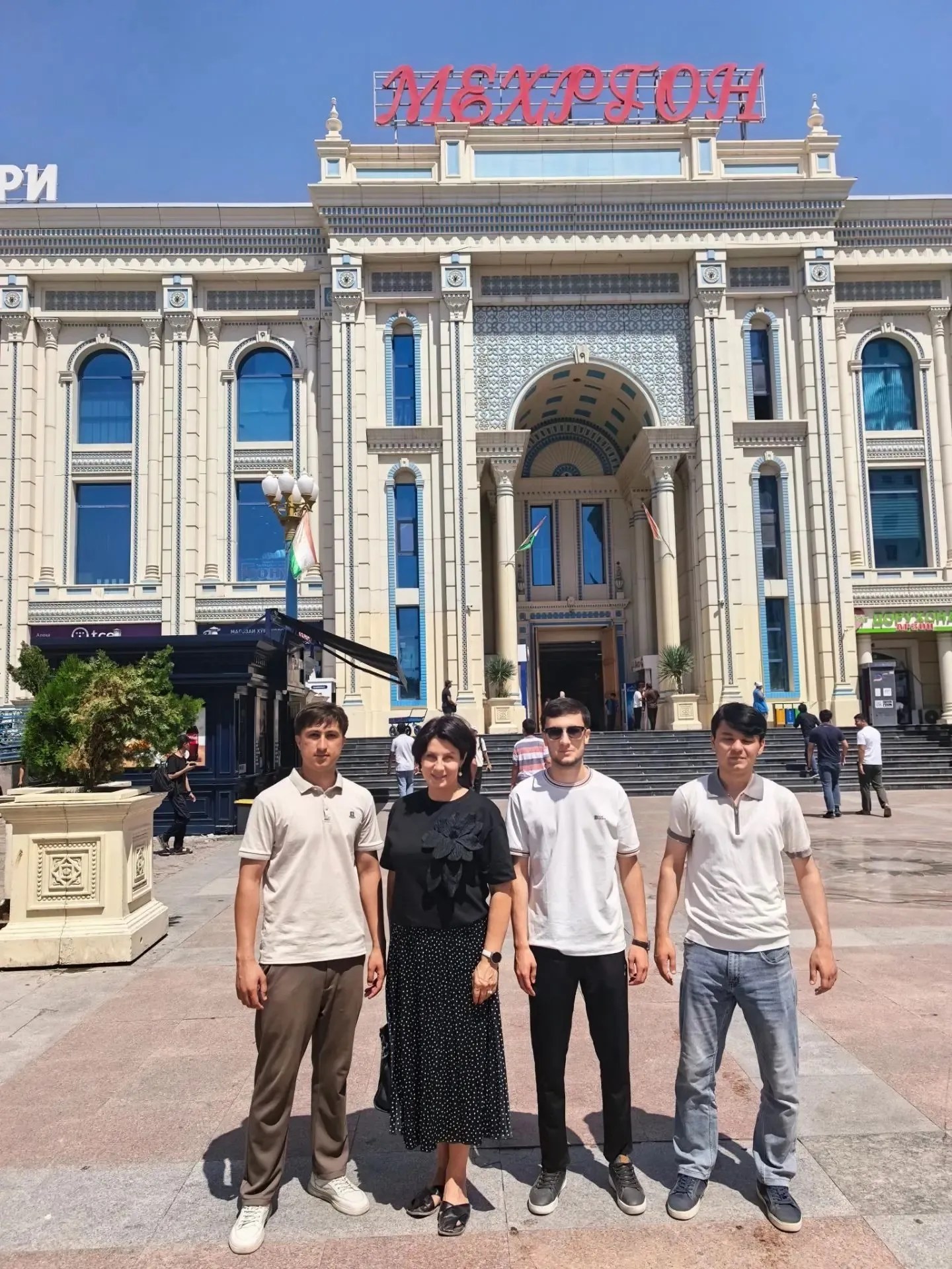 Elena Maslova meeting prospective students during the Amur State Medical Academy career guidance visit in Tajikistan.